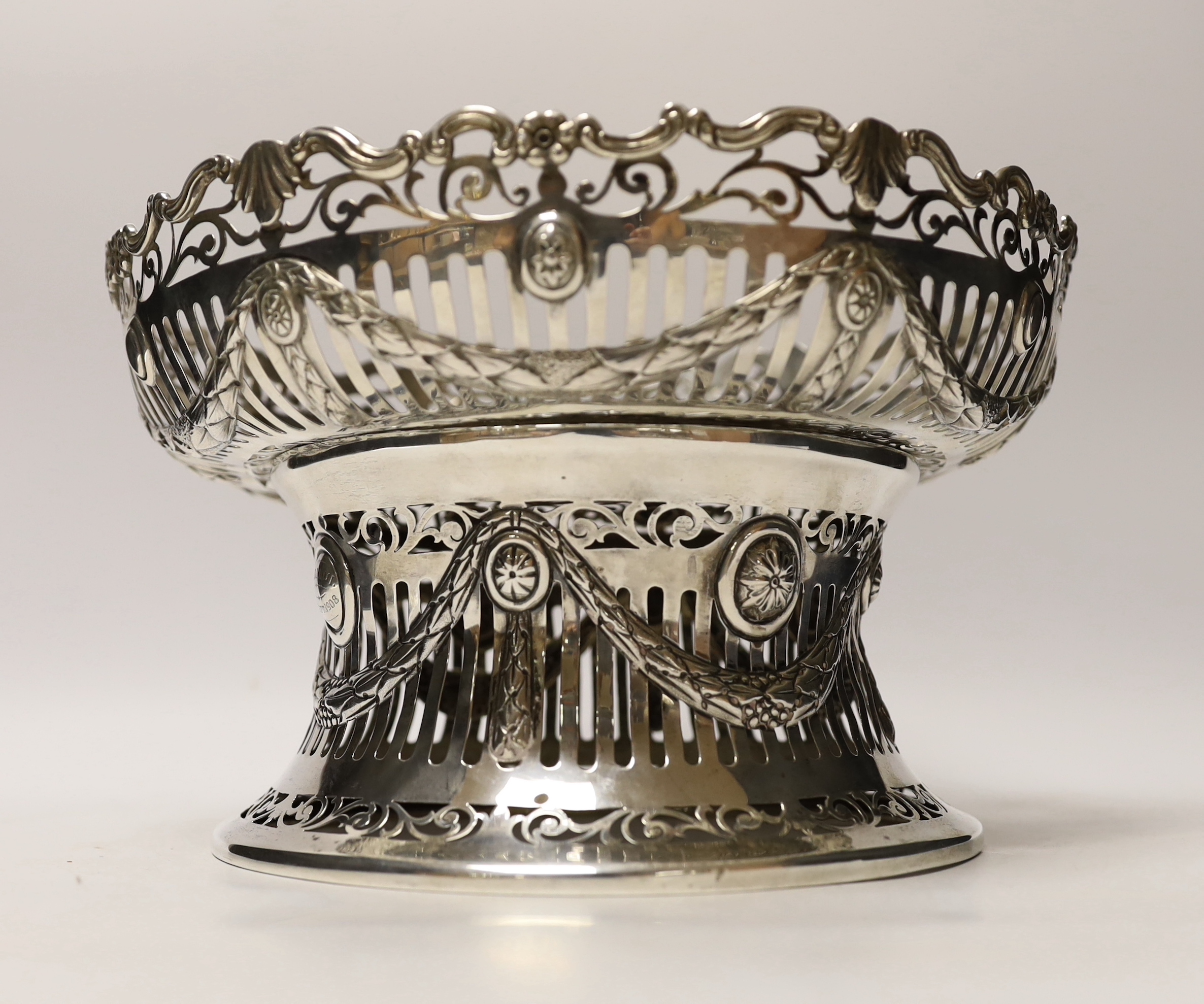 An Edwardian Irish silver dish ring and dish by Sharman D. Neil, Dublin, 1907/1908, dish diameter 25.9cm (a.f.), 26oz.